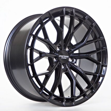 Black glossy alloy wheel with a complex multi-spoke design, photographed against a white background.