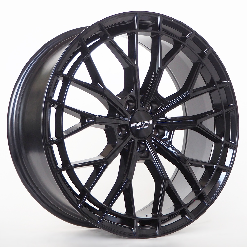 OLYMPUS DIGITAL CAMERA Black alloy wheel rim with a multi-spoke design and center cap reading 'Forza Wheels'